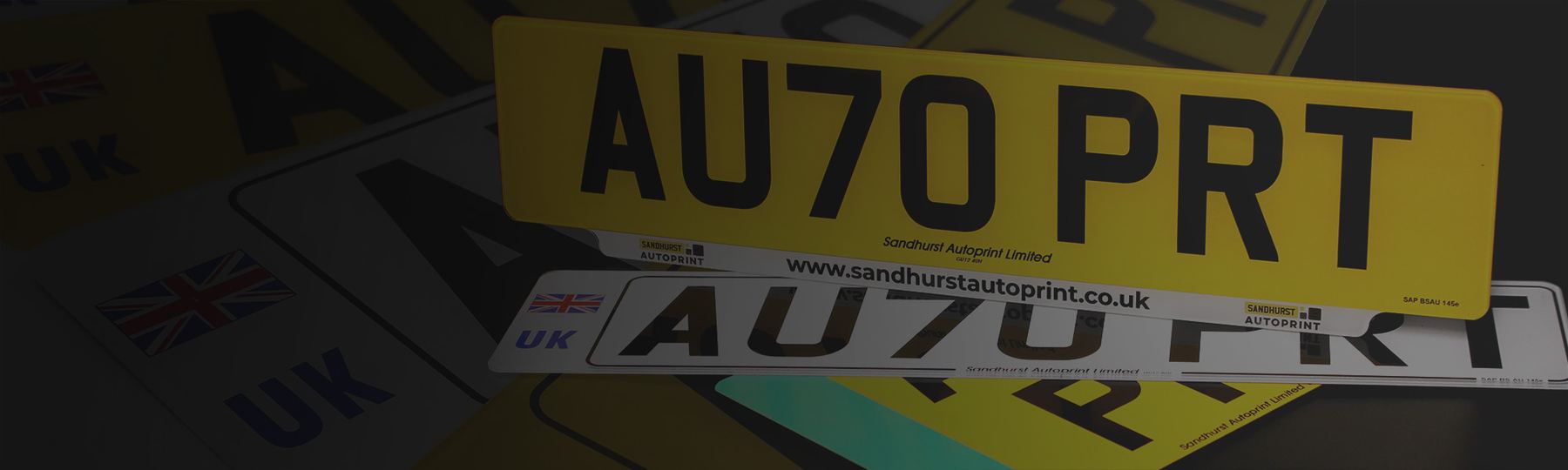 Ready made yellow rear and white front number plates printed with the Sandhurst Autoprint supplier details