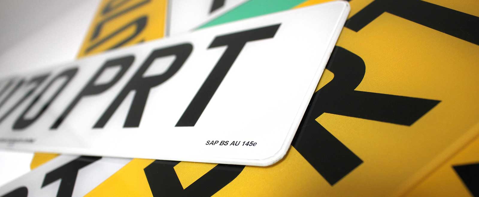 Finished number plates from a Sandhurst Autoprint manufacturing system